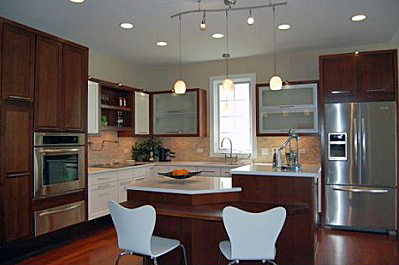 kitchen in the LIFEhouse with its many levels of lighting, multiple work center levels, and fixtures and appliances with Universal Design features